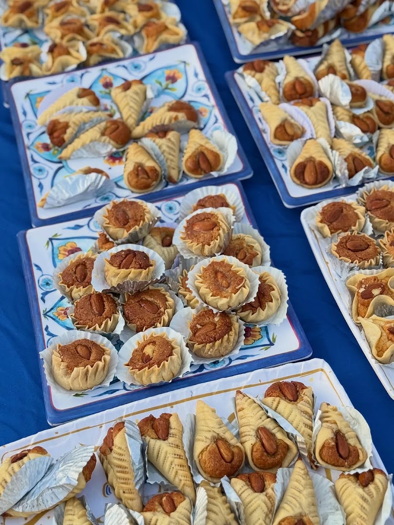 Bab Dzira & Coffee: appetizing display of breakfast pastries