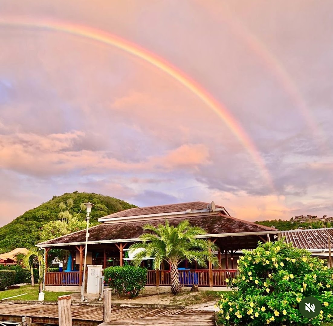 Out Out Bar & Lounge: beautiful exterior shot with rainbow