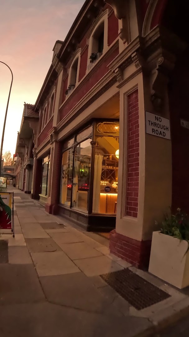 BAR SEPTIMUS: attractive exterior shot at dusk