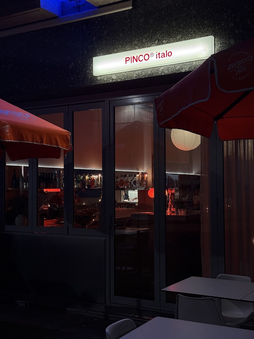 Pinco Italo: inviting exterior shot at night
