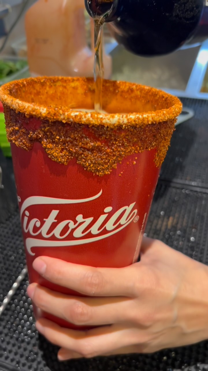 Cartel Del Taco: appetizing drink preparation photo
