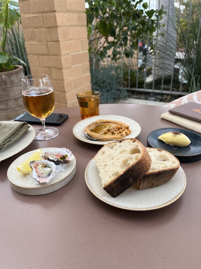 Ruma Rooftop: appetizing food and drink presentation