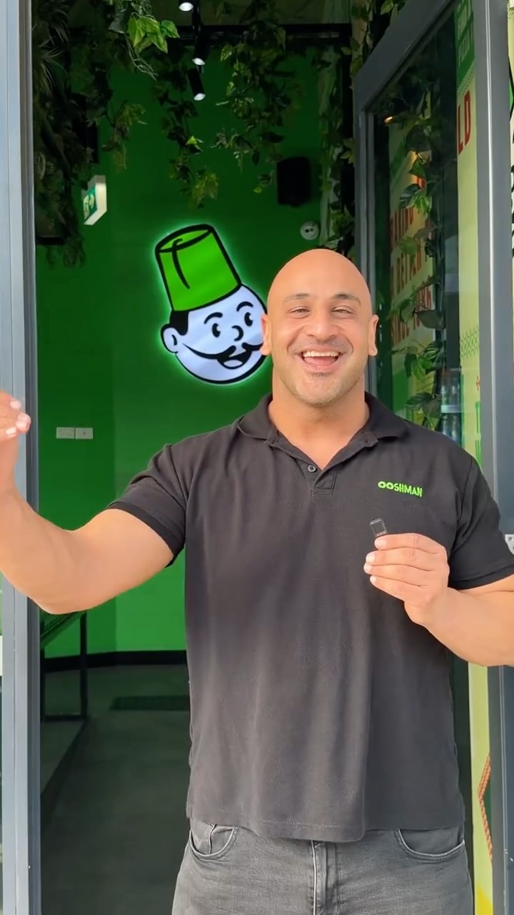 OOSHMAN: friendly staff member welcoming guests