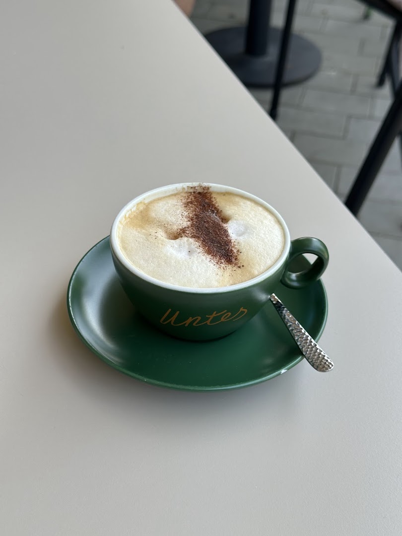 Untes Café: appealing photo of branded coffee
