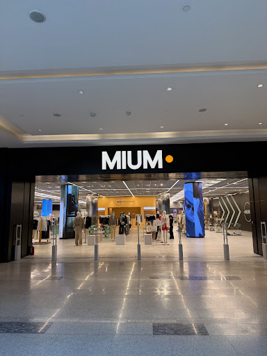 MIUM: clear storefront view of shop