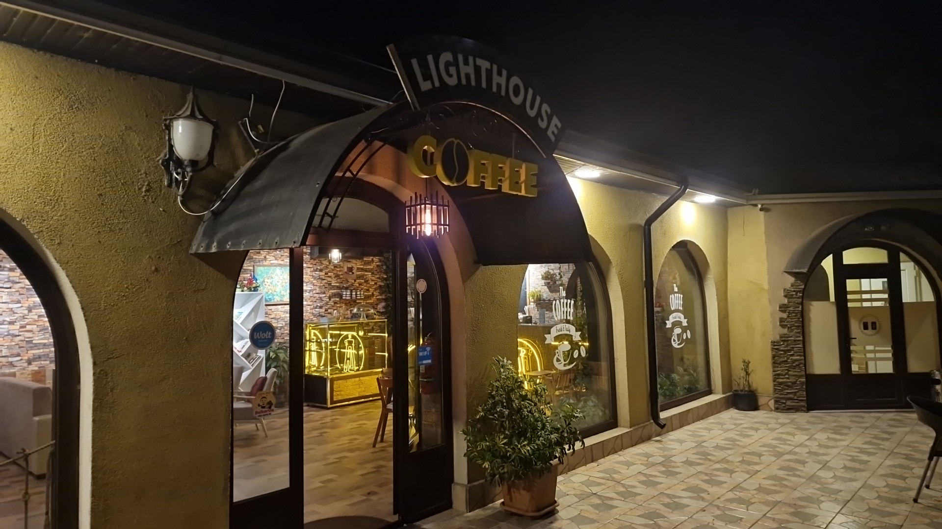 Lighthouse Coffeeshop: clear, inviting exterior night shot