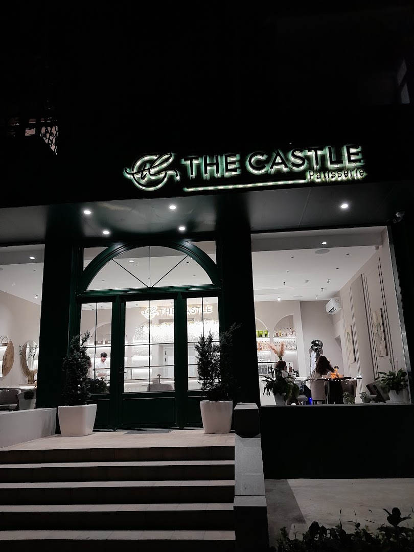The Castle Patisserie: clear, inviting storefront at night