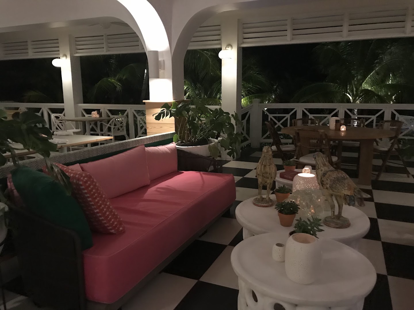The Pink Mermaid: inviting and well-lit restaurant terrace