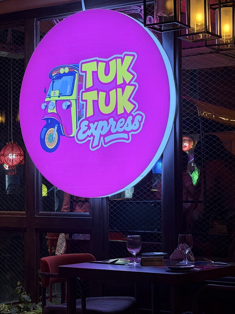 TukTuk Express: attractive interior with restaurant branding