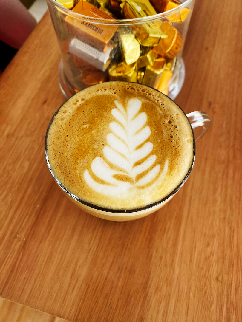 The Coffee Brewtique Co.: appealing latte art photo
