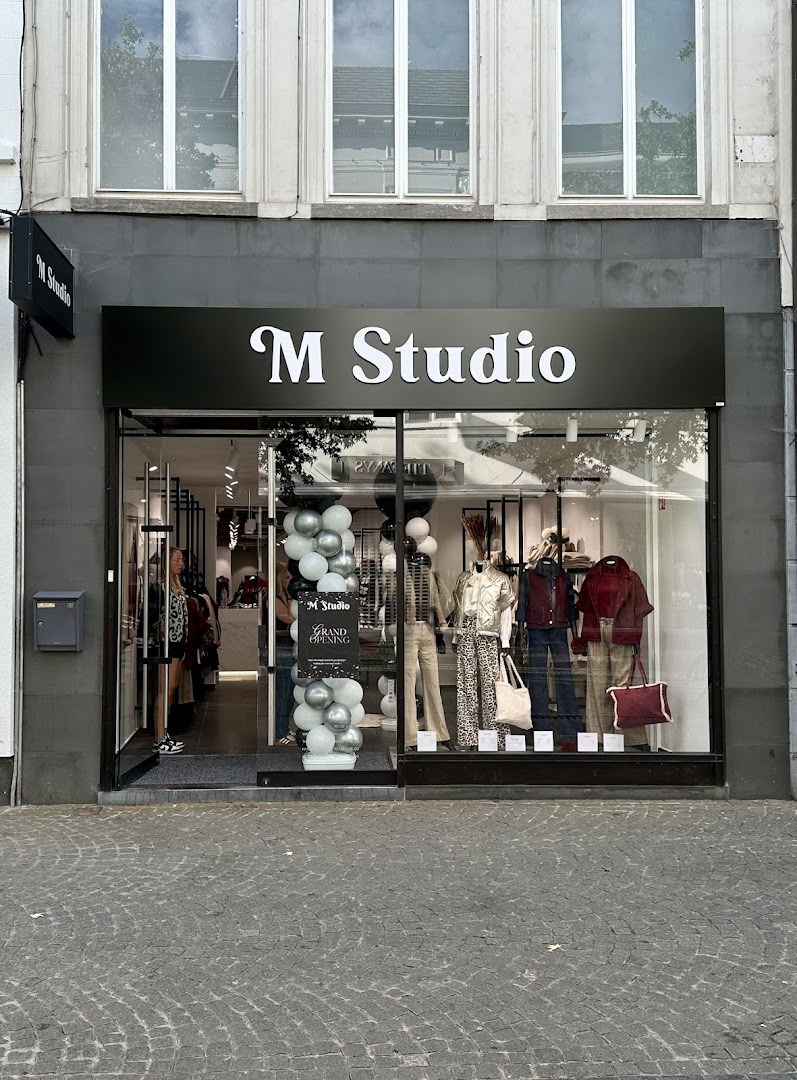 M Studio: clear storefront photo of shop