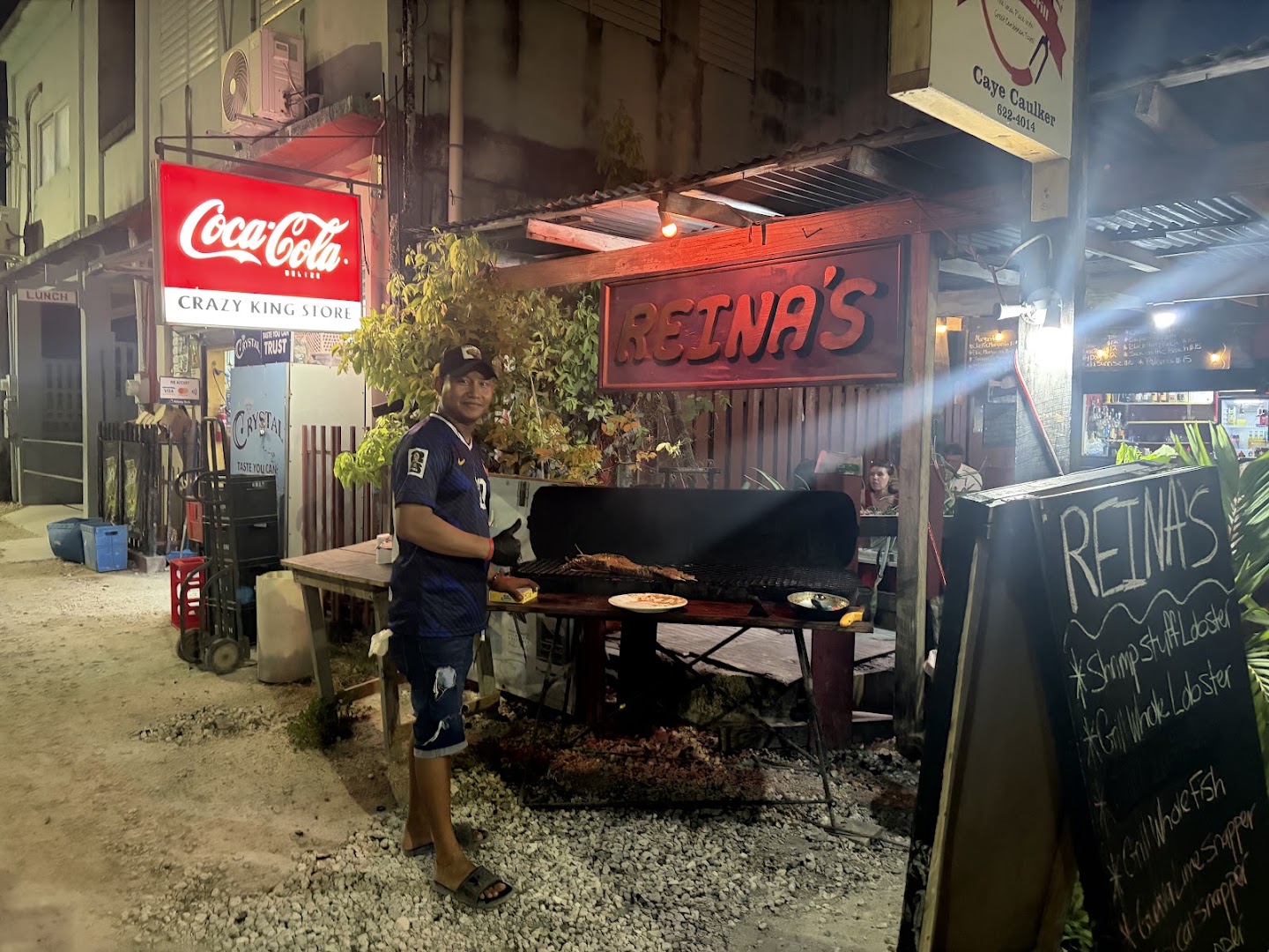Reina's: staff cooking at venue