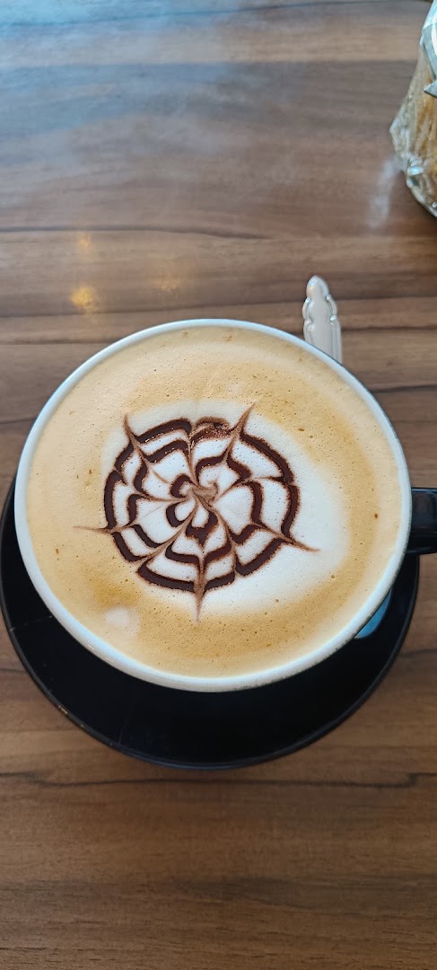 Café Arcoíris: appealing latte art photo