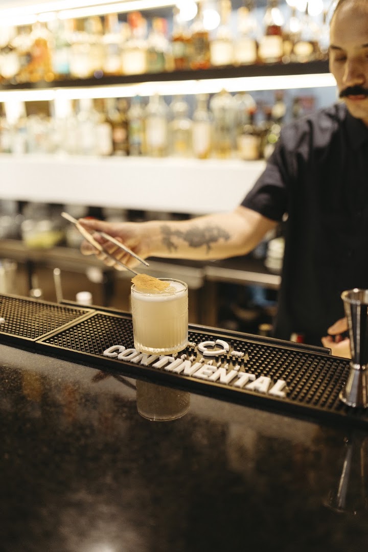 Continental Bar: professional shot of cocktail preparation