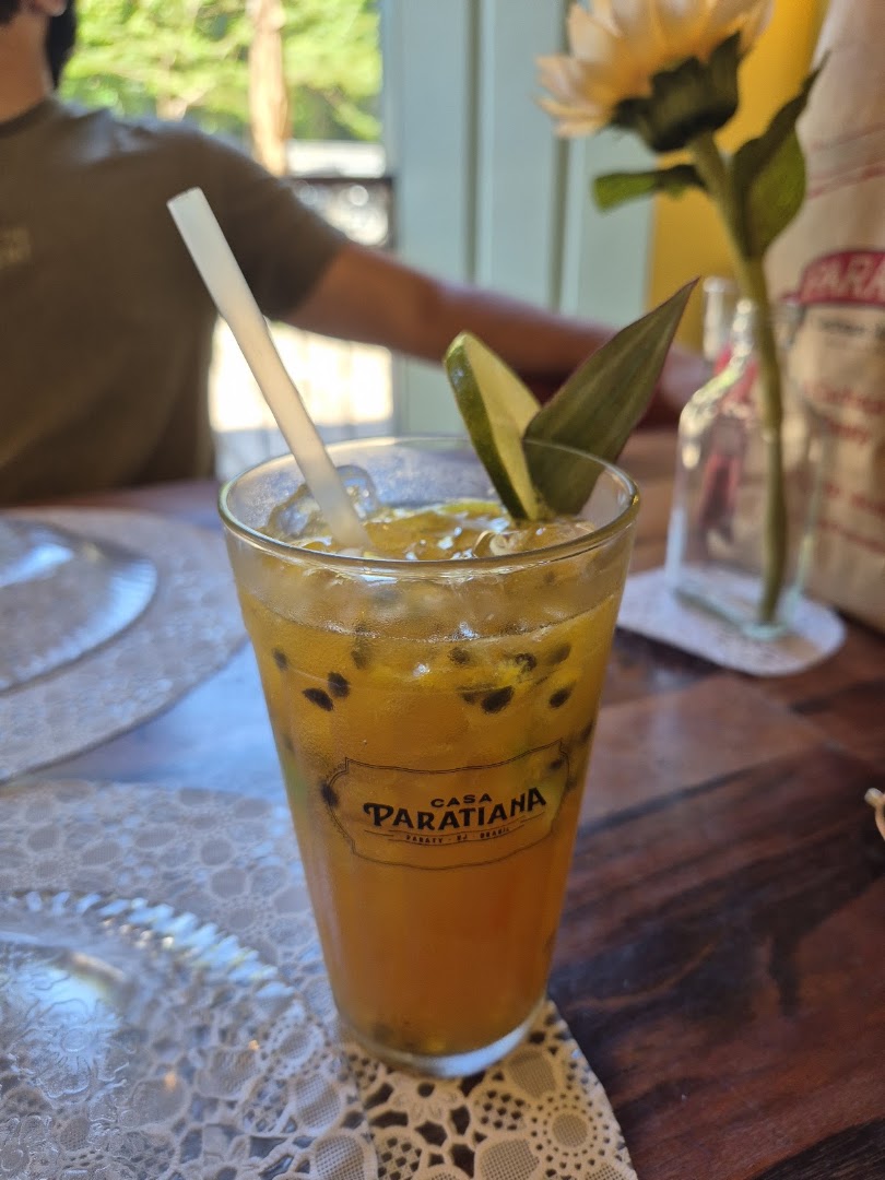 Casa Paratiana: appetizing drink photo with branding
