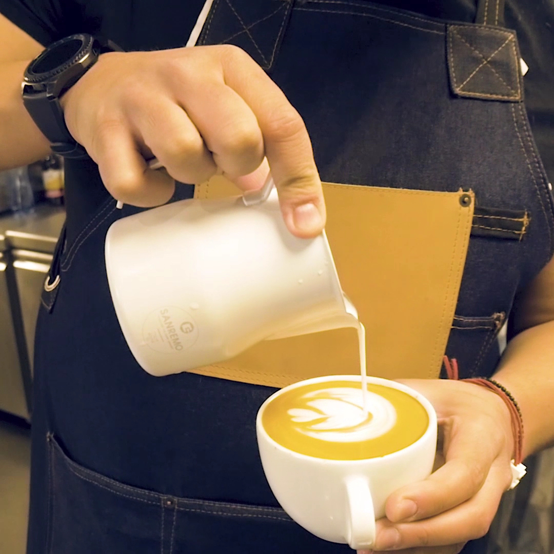 The Family Coffee Roasters: high quality latte art photo