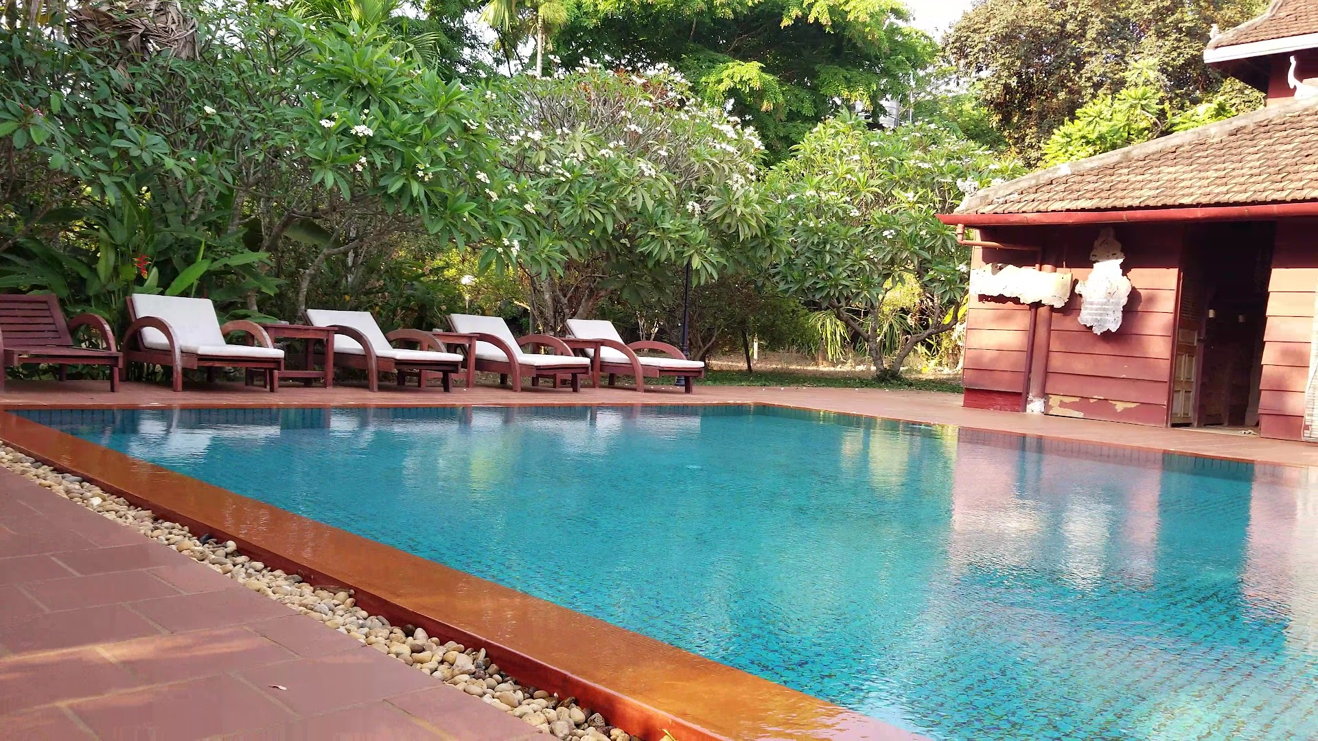 Terres Rouges Lodge: attractive pool and garden area