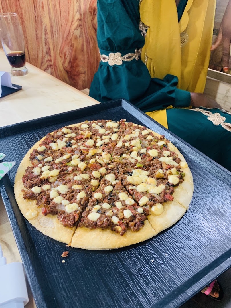 Sadaqa Halal Food: appetizing photo of served food