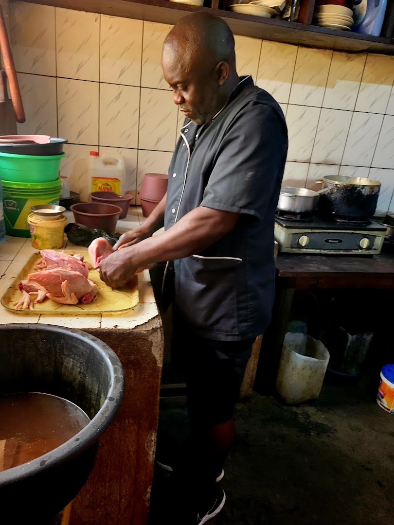 Chenjo's Grill: authentic kitchen food preparation scene