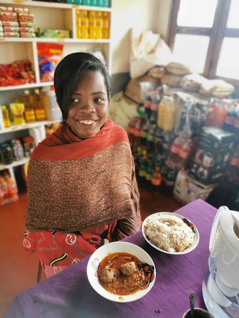 Njayou Home Restaurant/Boutique: customer enjoying restaurant food