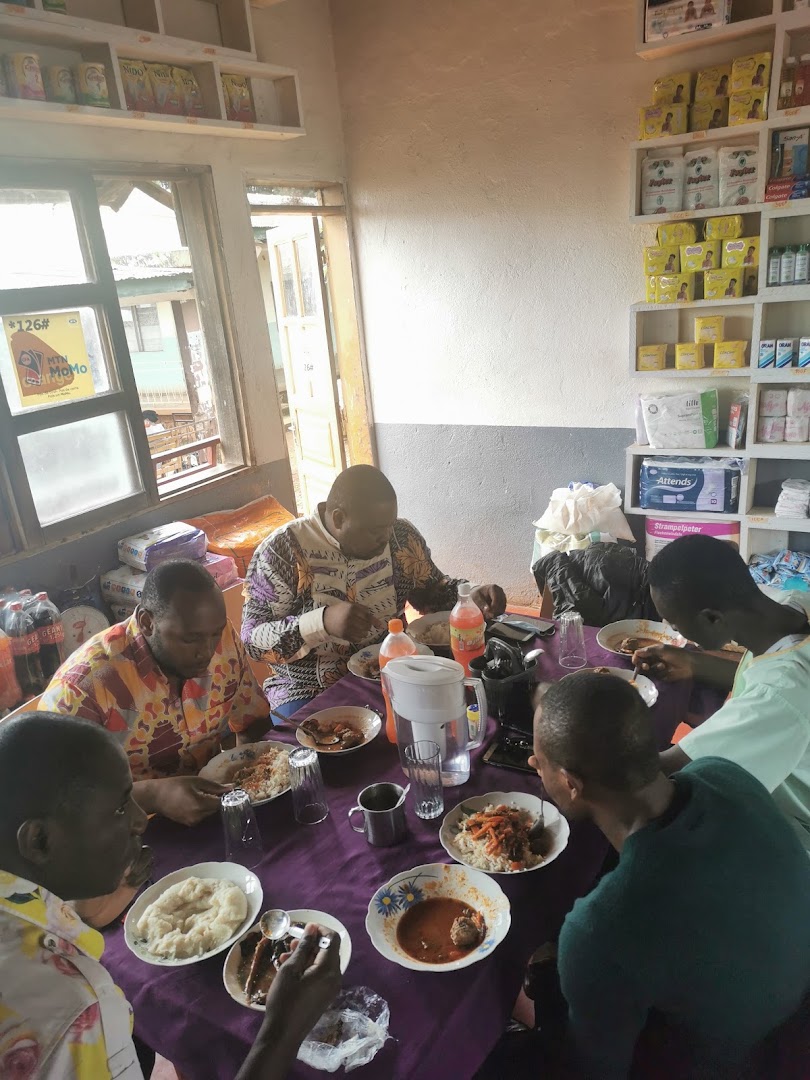Njayou Home Restaurant/Boutique: customers enjoying the food