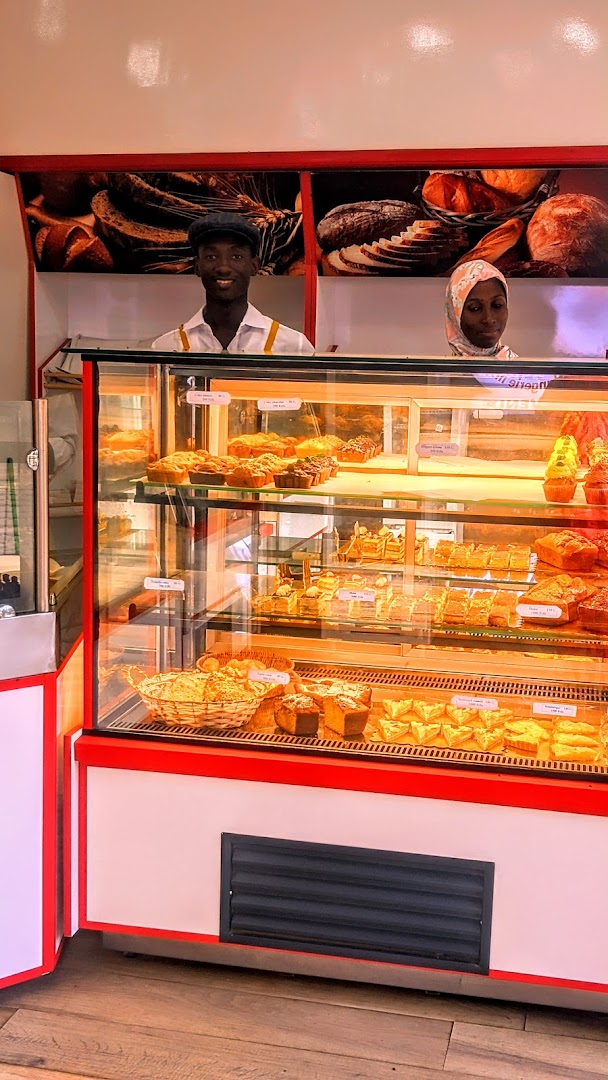 Chez Indira: clear photo of staff and food