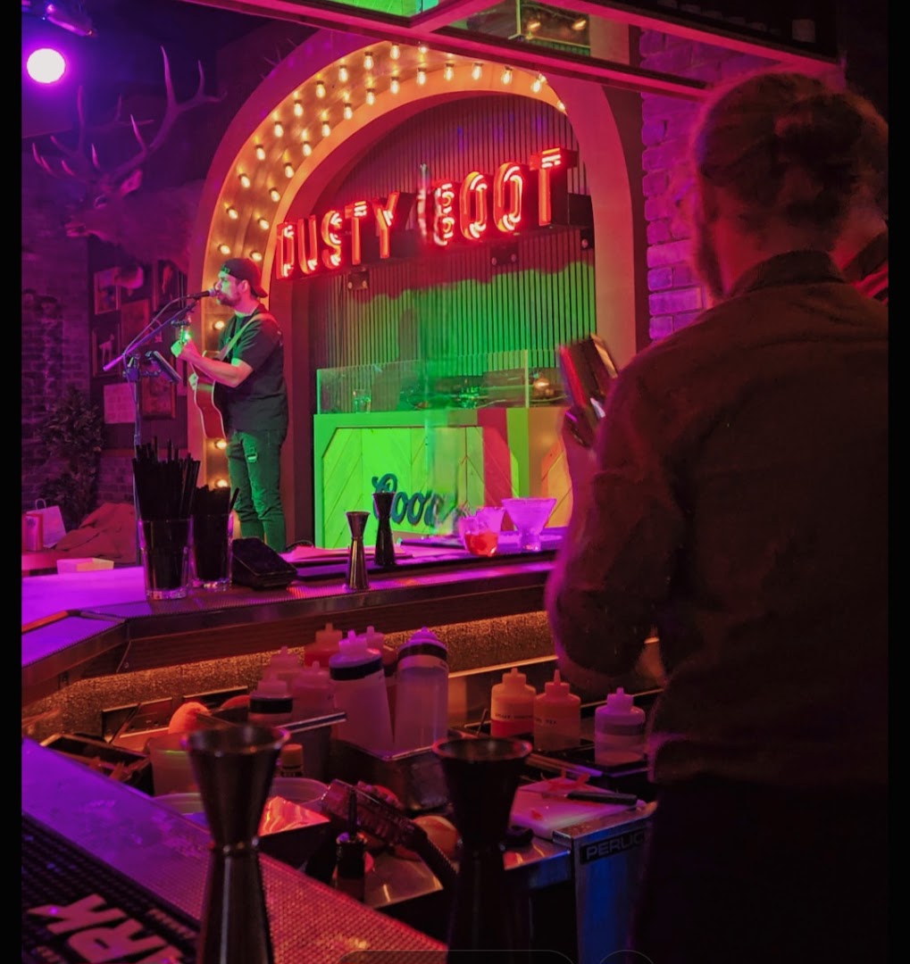 The Dusty Boot Saloon: lively bar atmosphere well