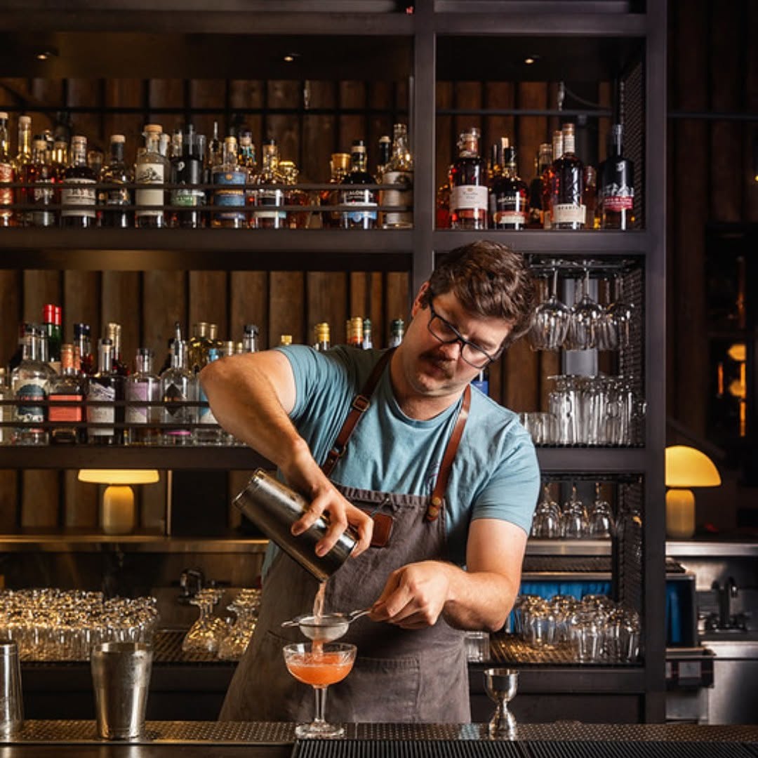 The Maligne Range: professional photo of bartender working