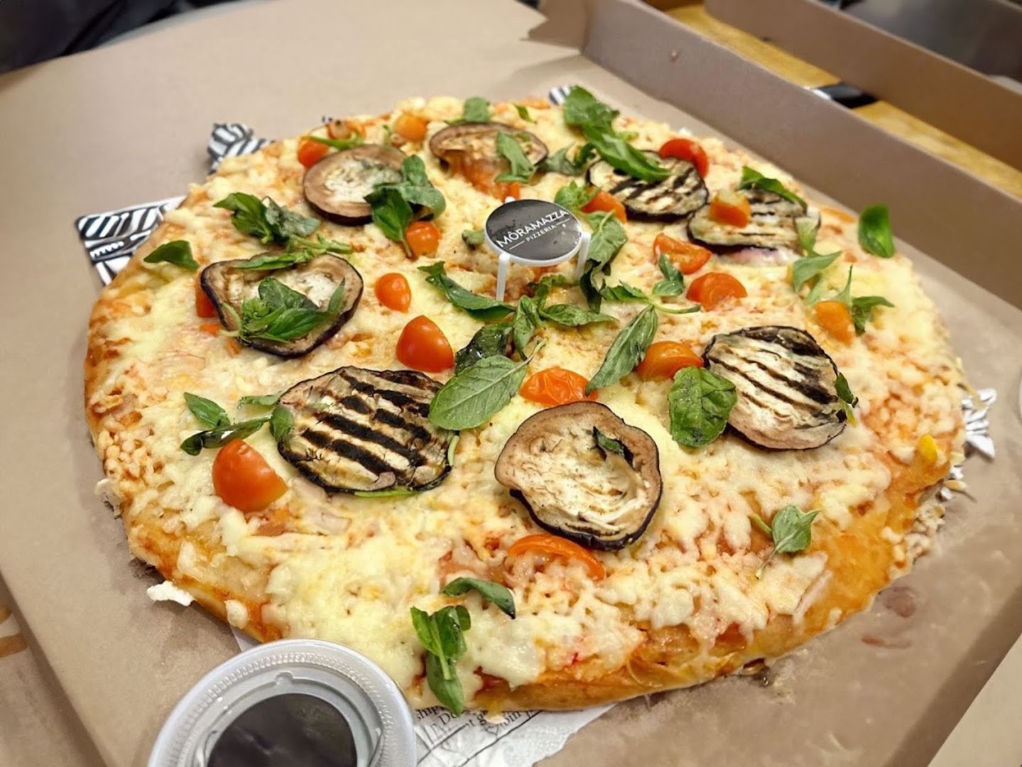 Môramazza: appetizing photo of restaurant pizza
