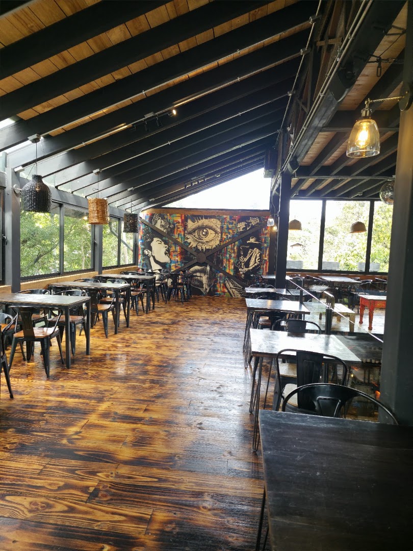 By Roots Smoke House: clear, inviting restaurant interior shot