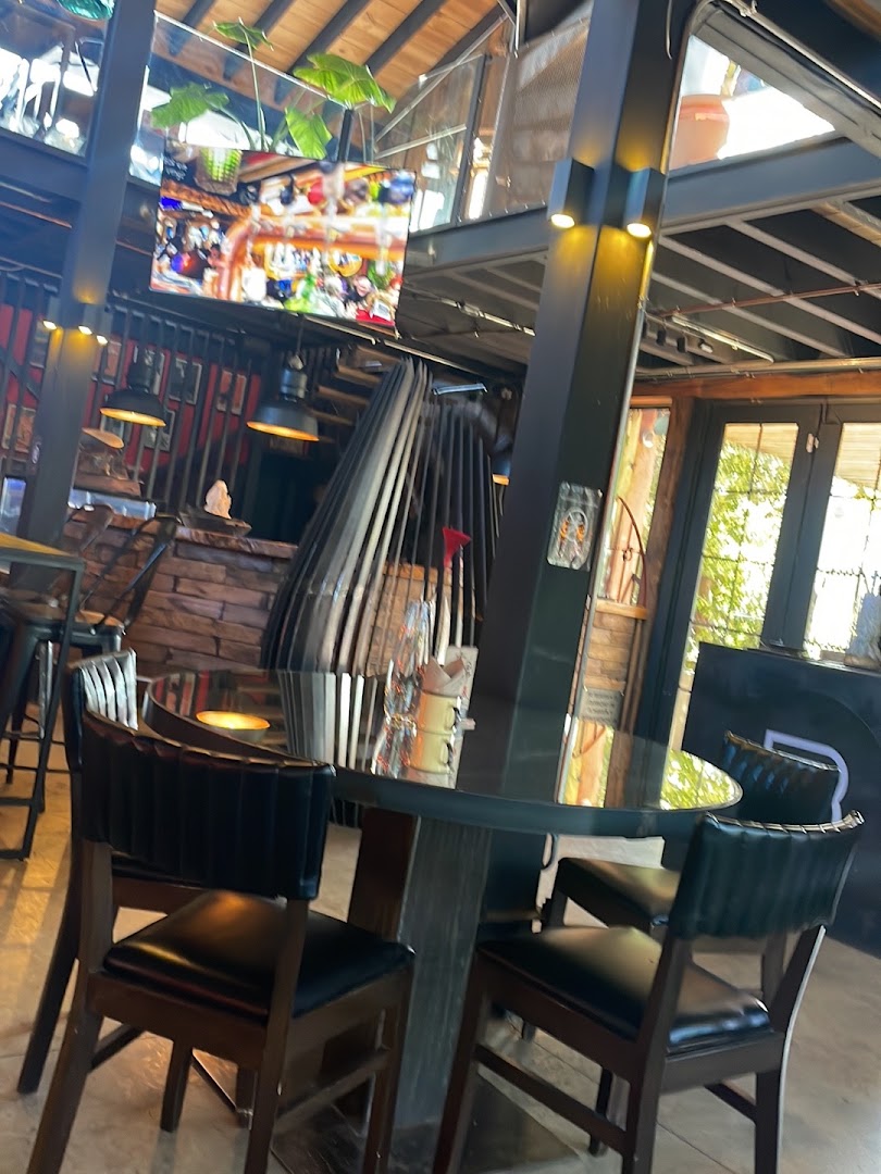 By Roots Smoke House: clear shot of restaurant interior