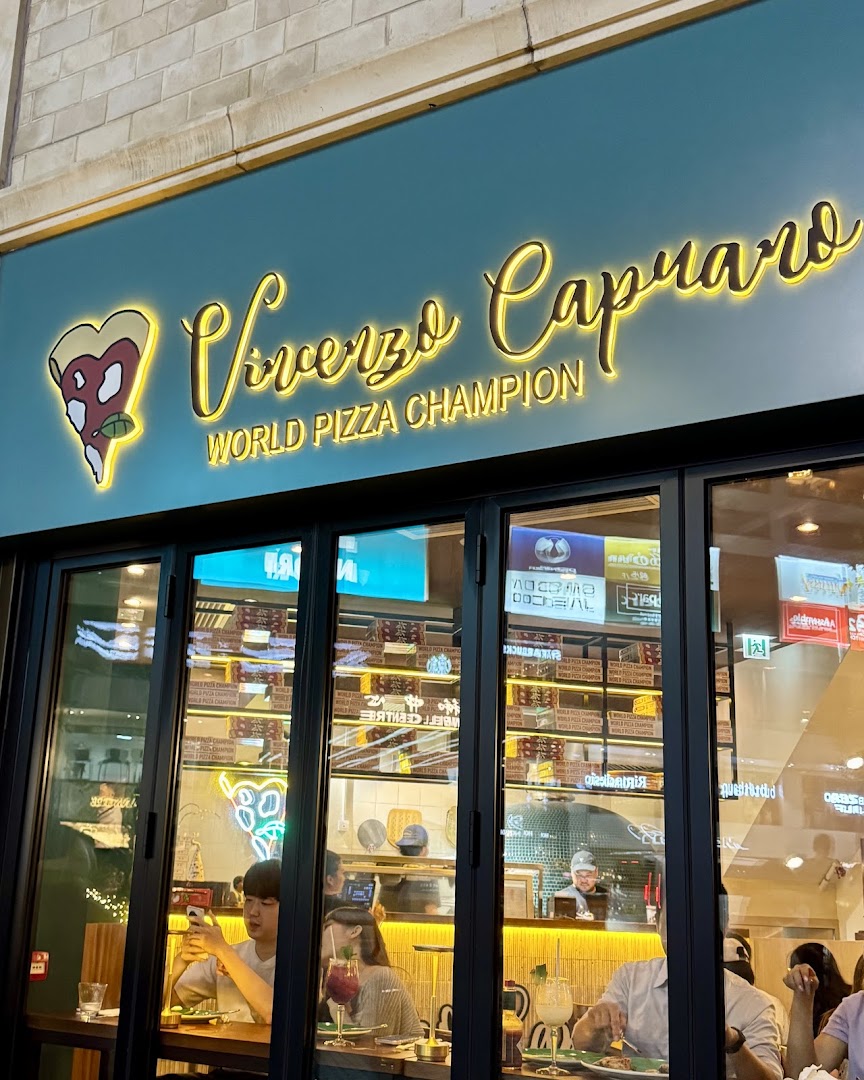 Vincenzo Capuano: clear, professional shot of storefront