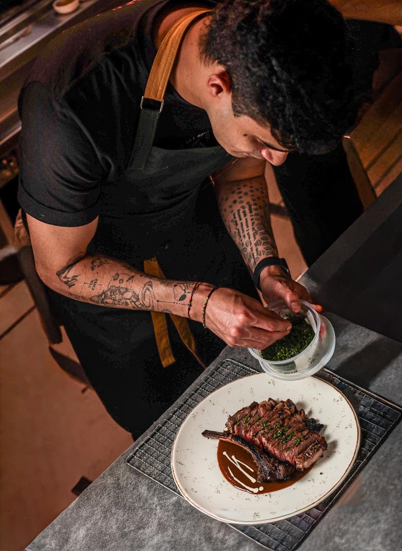 Orno: professional shot of chef plating