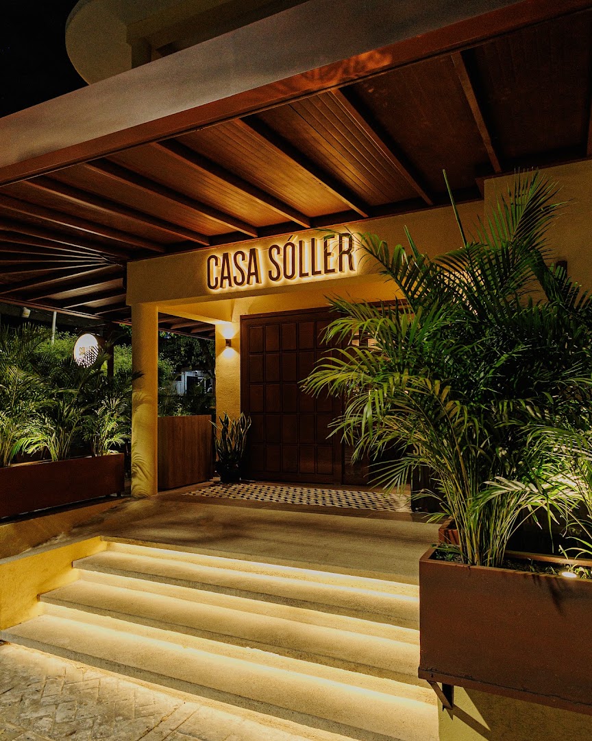 Casa Soller: professional, inviting exterior night shot