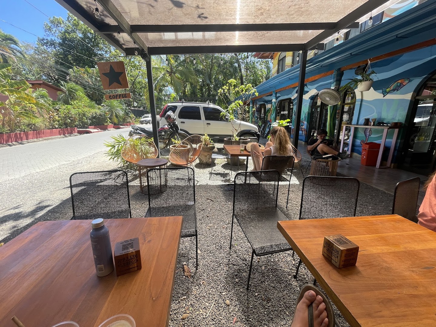 Rolling Waves Coffee: inviting outdoor seating area shown