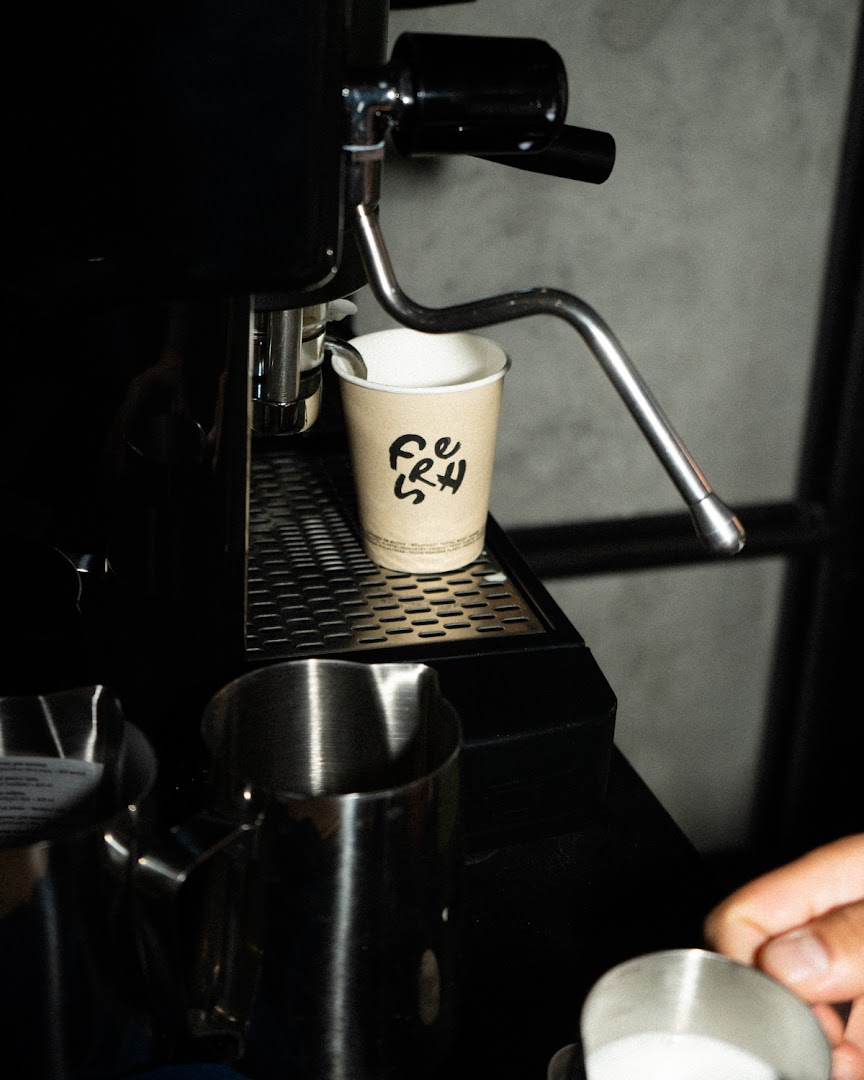 Fresh Healthy Bar: professional shot of coffee preparation