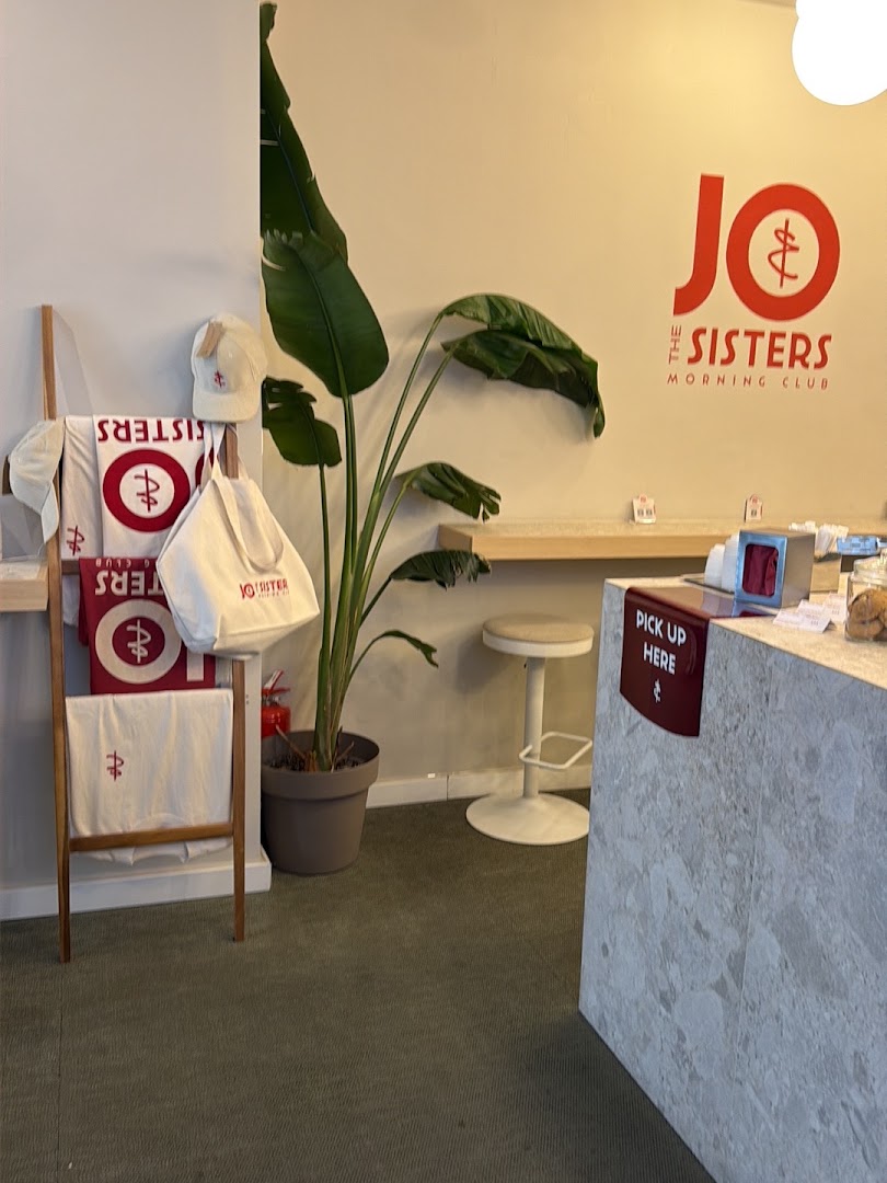 Jo & The Sisters: clean interior shot showing branding