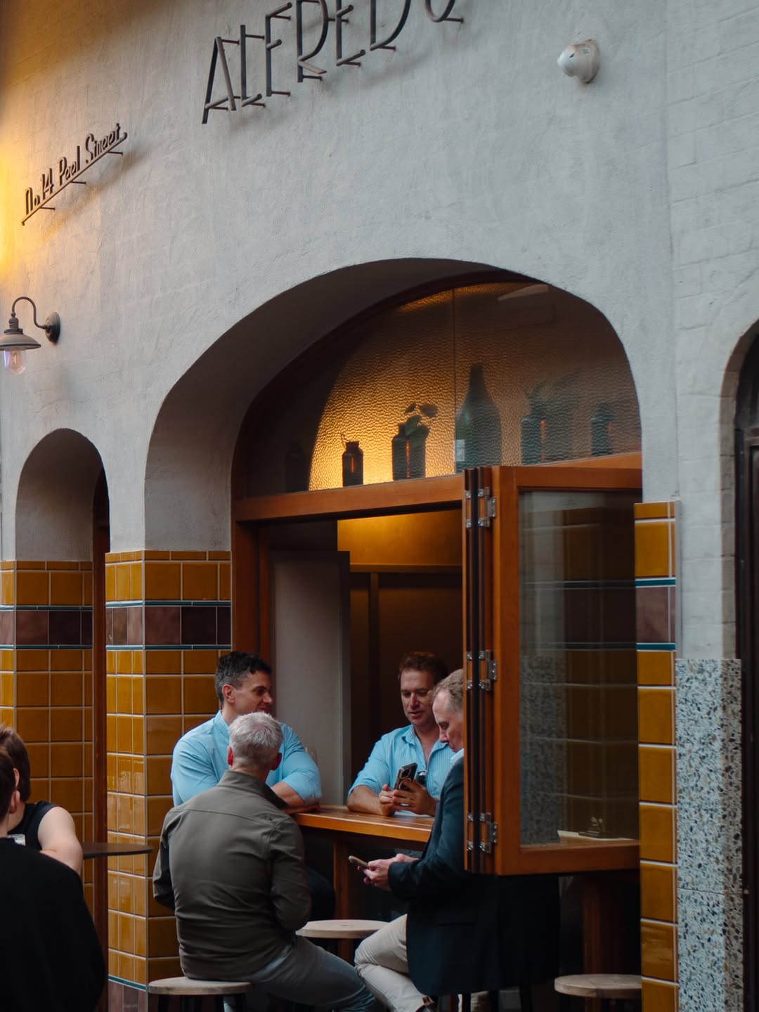 Alfred's Bar: inviting atmosphere with happy patrons