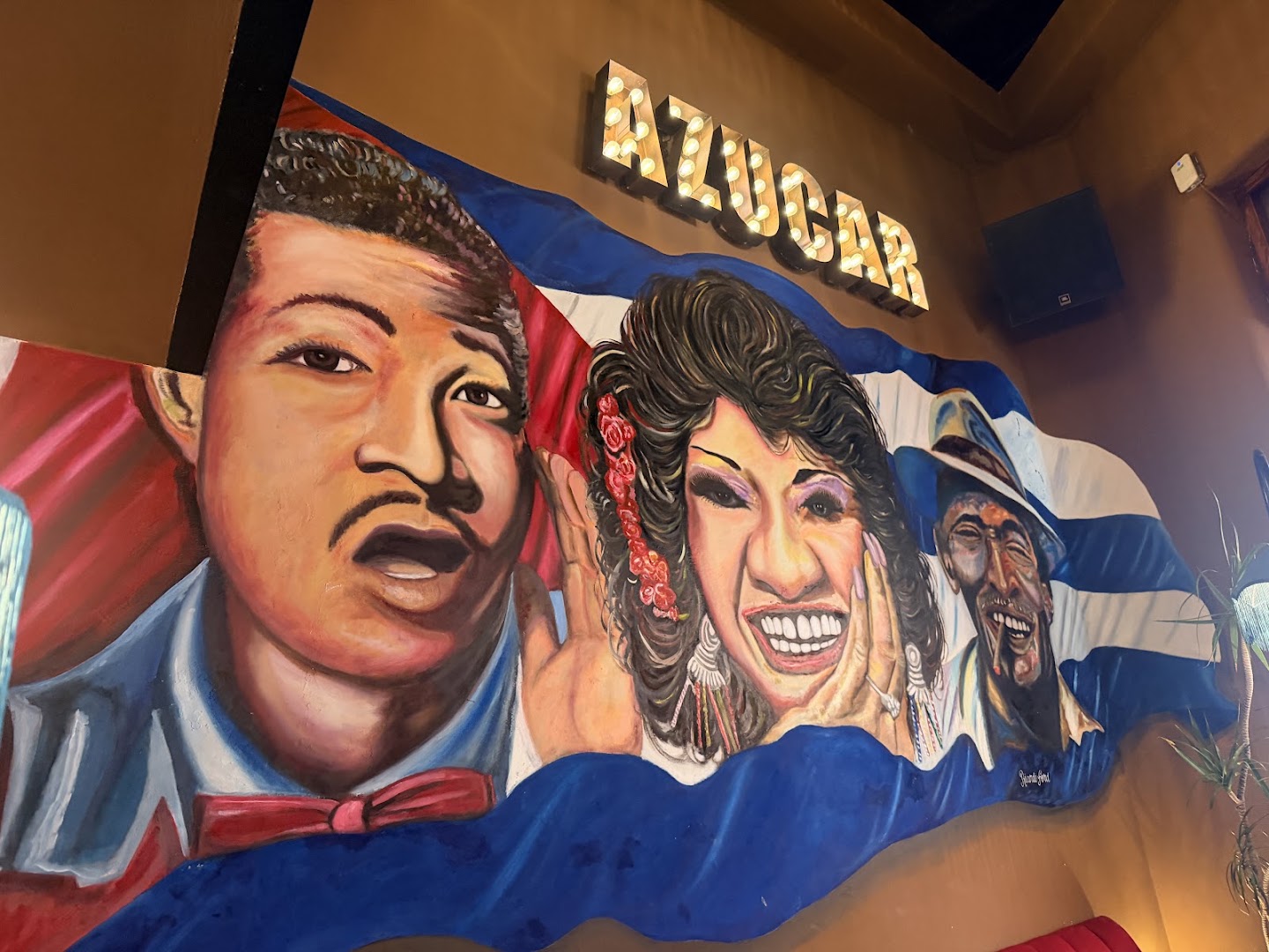 Antojos: attractive mural showcases venue atmosphere