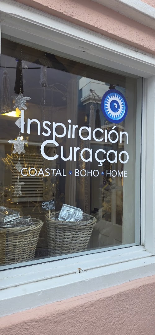Inspiración Curaçao: clear storefront photo showing branding