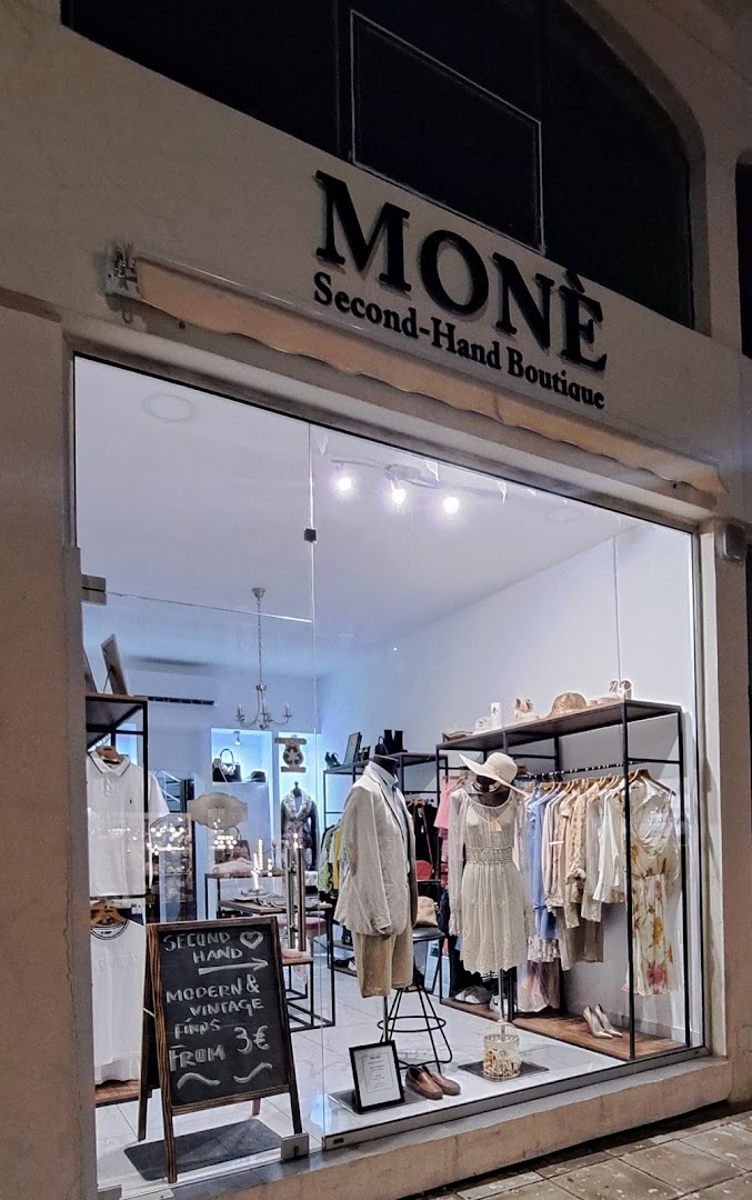 MONÈ Second-Hand Boutique: clear, professional storefront display photo