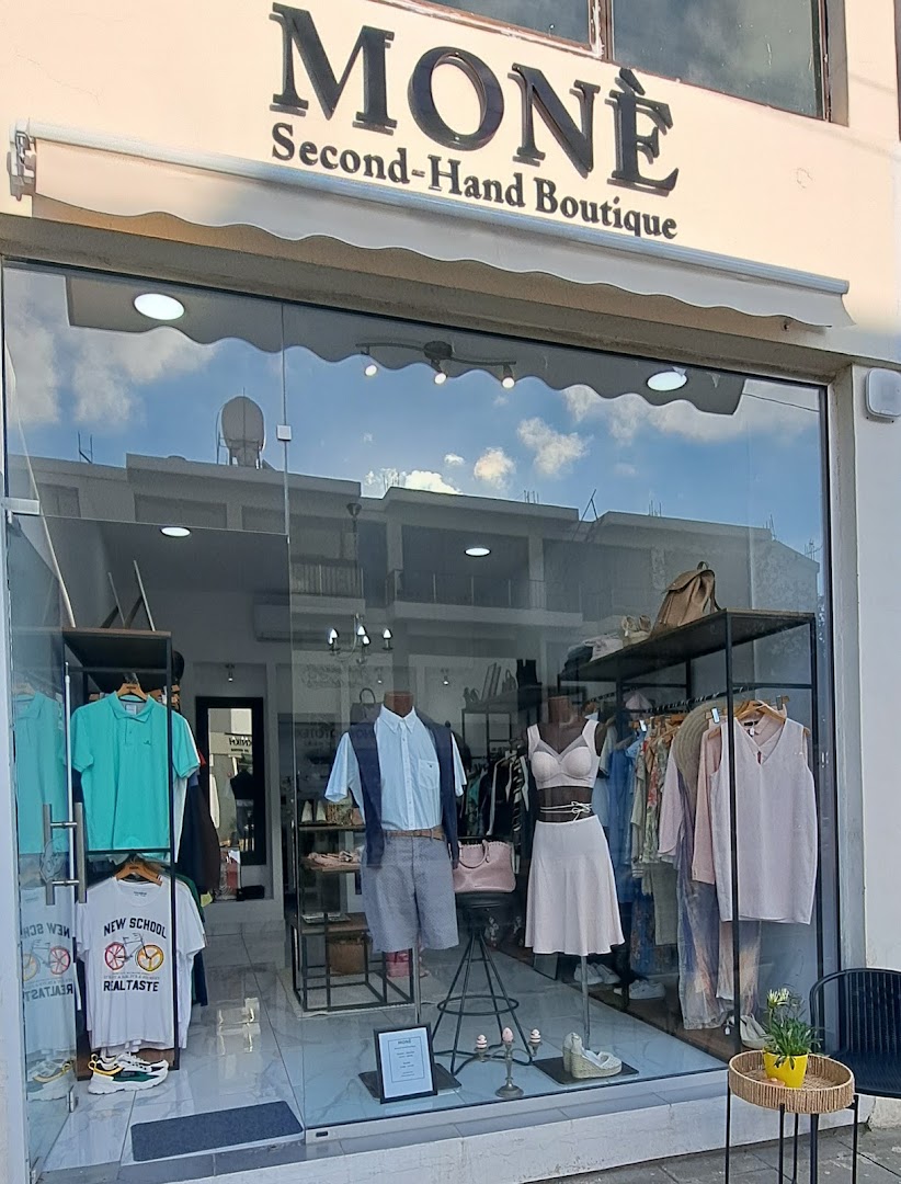 MONÈ Second-Hand Boutique: clear storefront photo showing products