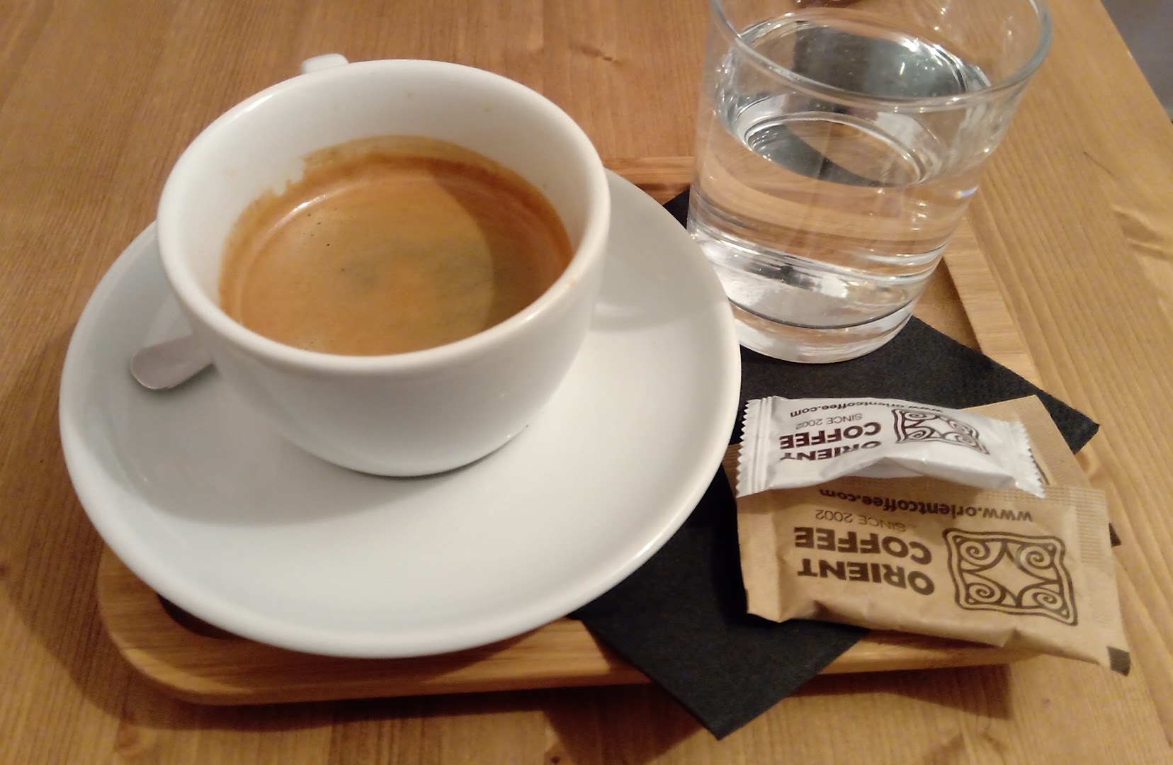 Orient Coffee: appetizing coffee and water presentation