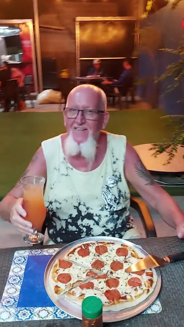 Boca Chica Food Truck: customer enjoying food and drink