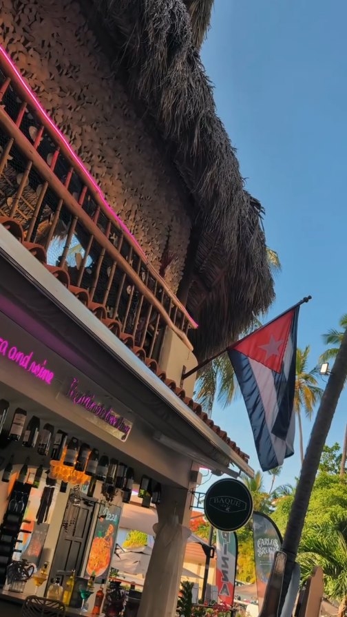 Corales Pizzeria & Cigar Club: attractive exterior shot of venue
