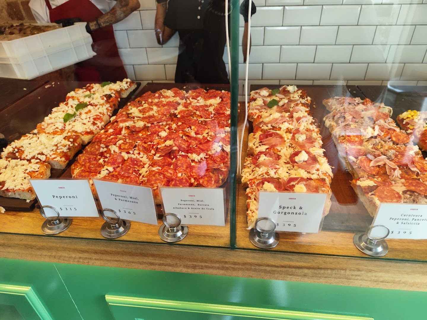 Curcio Pizza al Taglio: appetizing display of fresh pizza