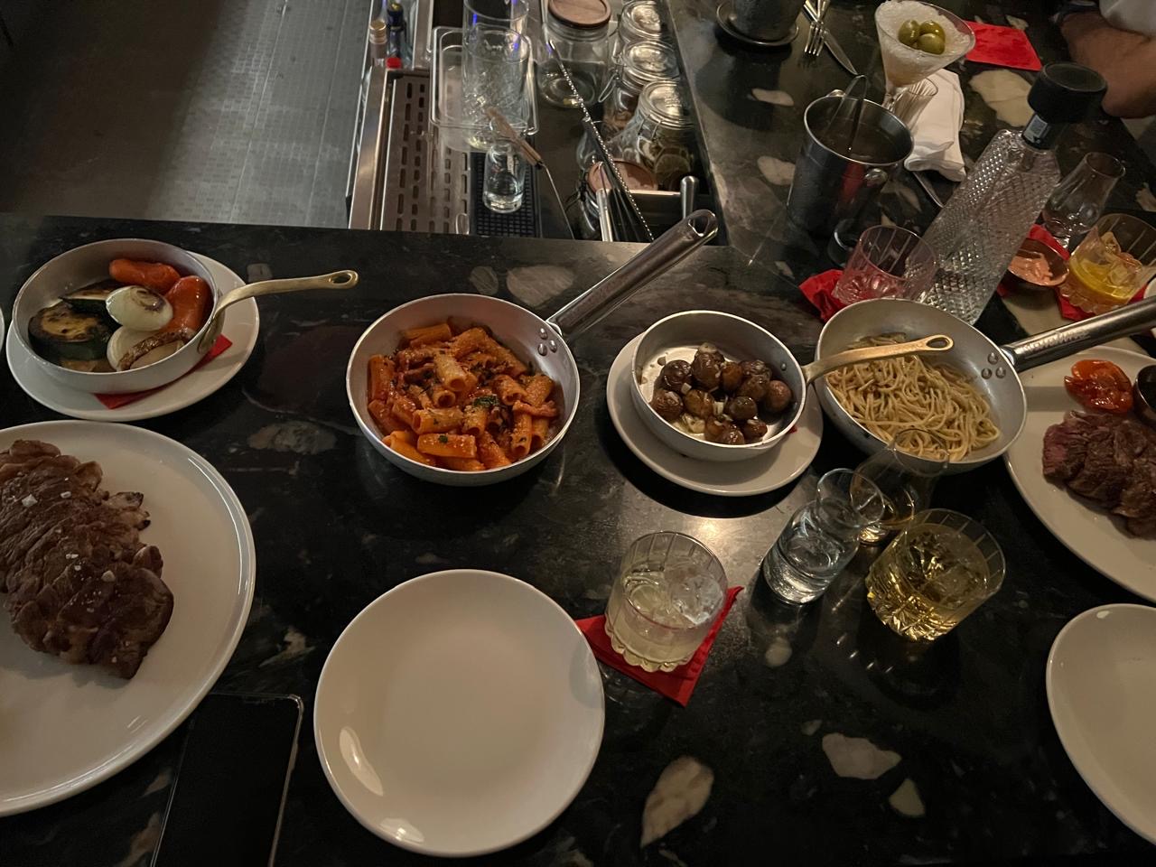 Maialino: appetizing food spread at bar