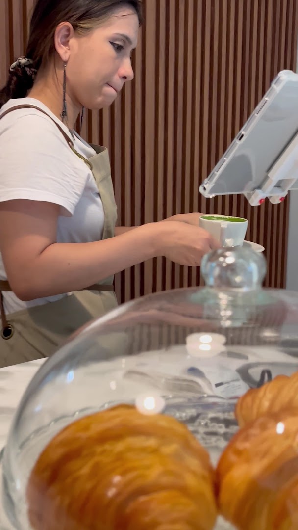 The Hearty Hub: professional staff preparing quality drink