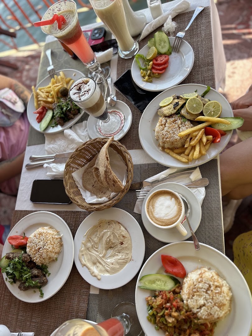 Aswan Moon: appetizing food and drink spread