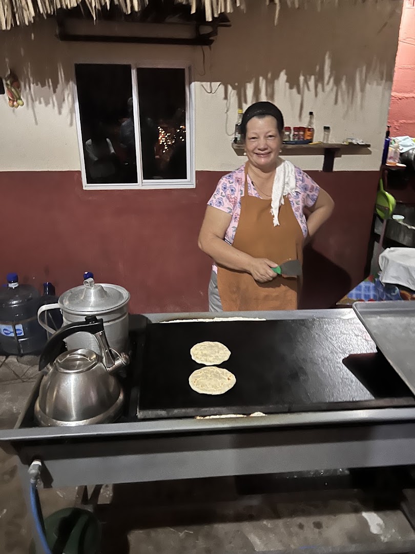 Pupusería La Guanaquita: authentic photo of staff cooking